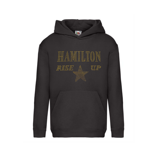 Children's black pullover hoodie,  on the front is a gold sparkling "Hamiton, Rise up" lettering with a gold star set just underneath.
design is made up of sparkling rhinestones that catch the light beautifully