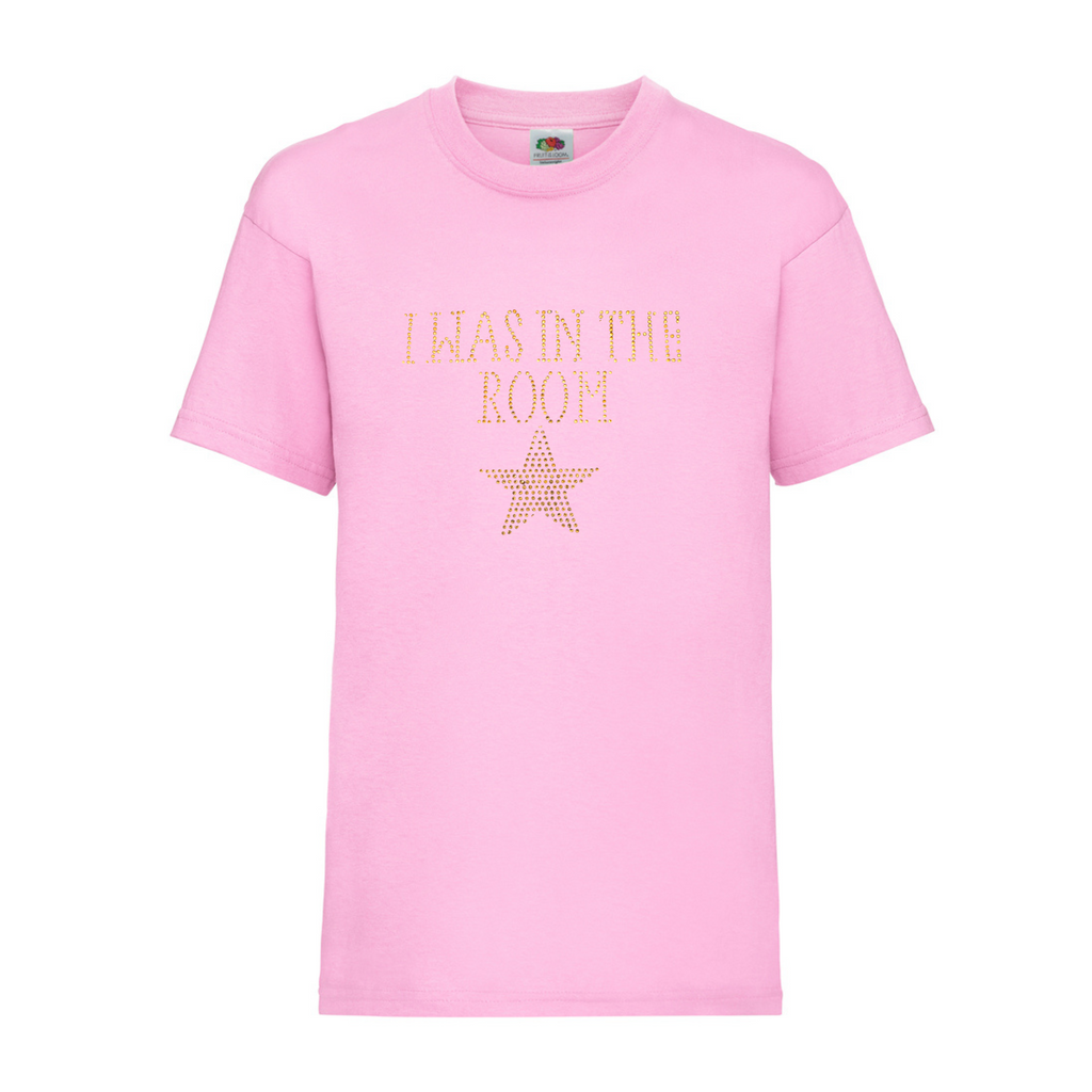 Pink cotton short sleeve t shirt with I WAS IN THE ROOM spelt out and a gold star underneath.
The design is made up of gold rhinestones that sparkle in the light beautifully.
