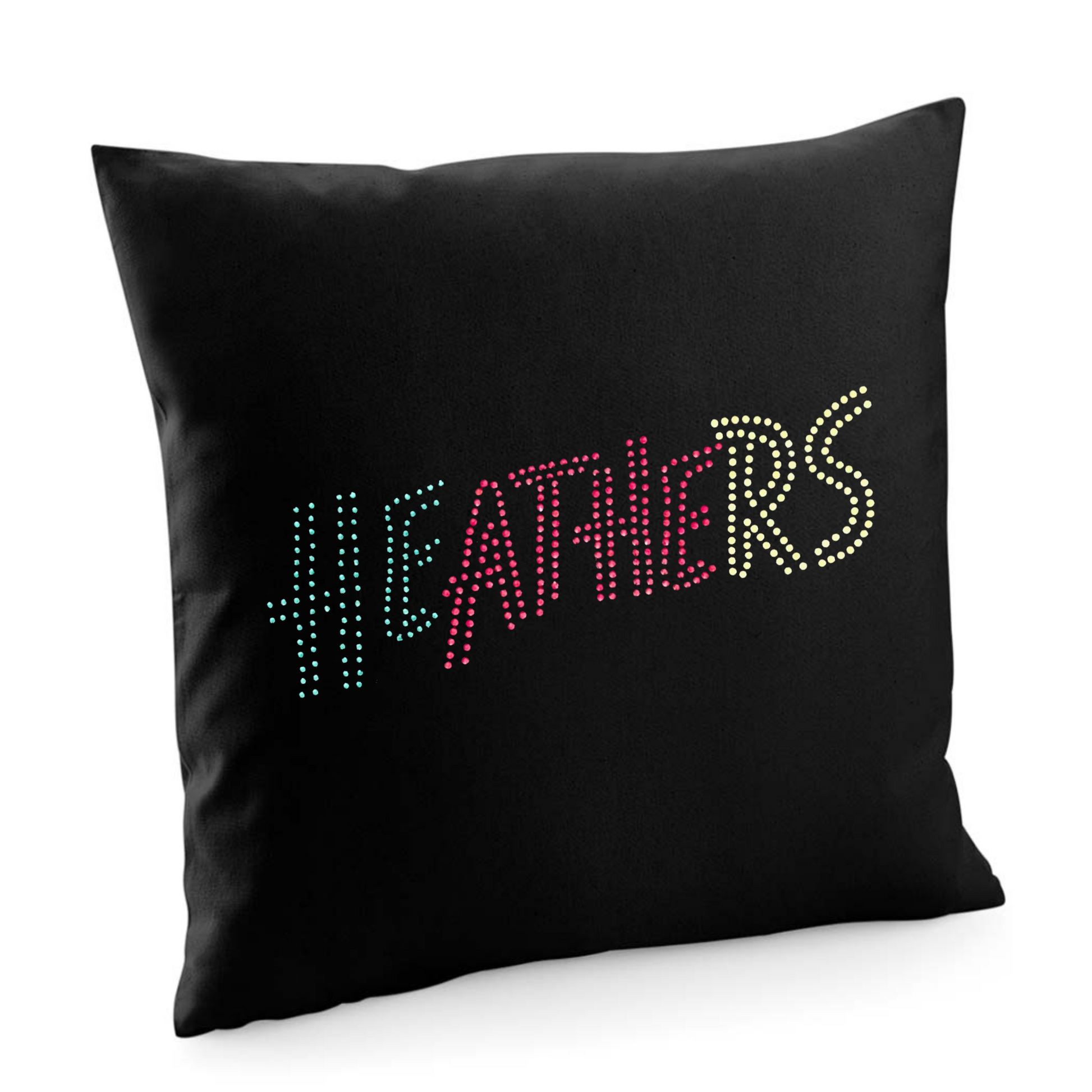 BLACK COTTON CUSHION COVER WITH HEATHERS LETTERING THAT IS GREEN, RED TO YELLOW.
THE DESIGN IS MADE UP OF HOT FIX RHINESTONES THAT HEAT PRESSED AND CATCH THE LIGHT BEAUTIFULLY