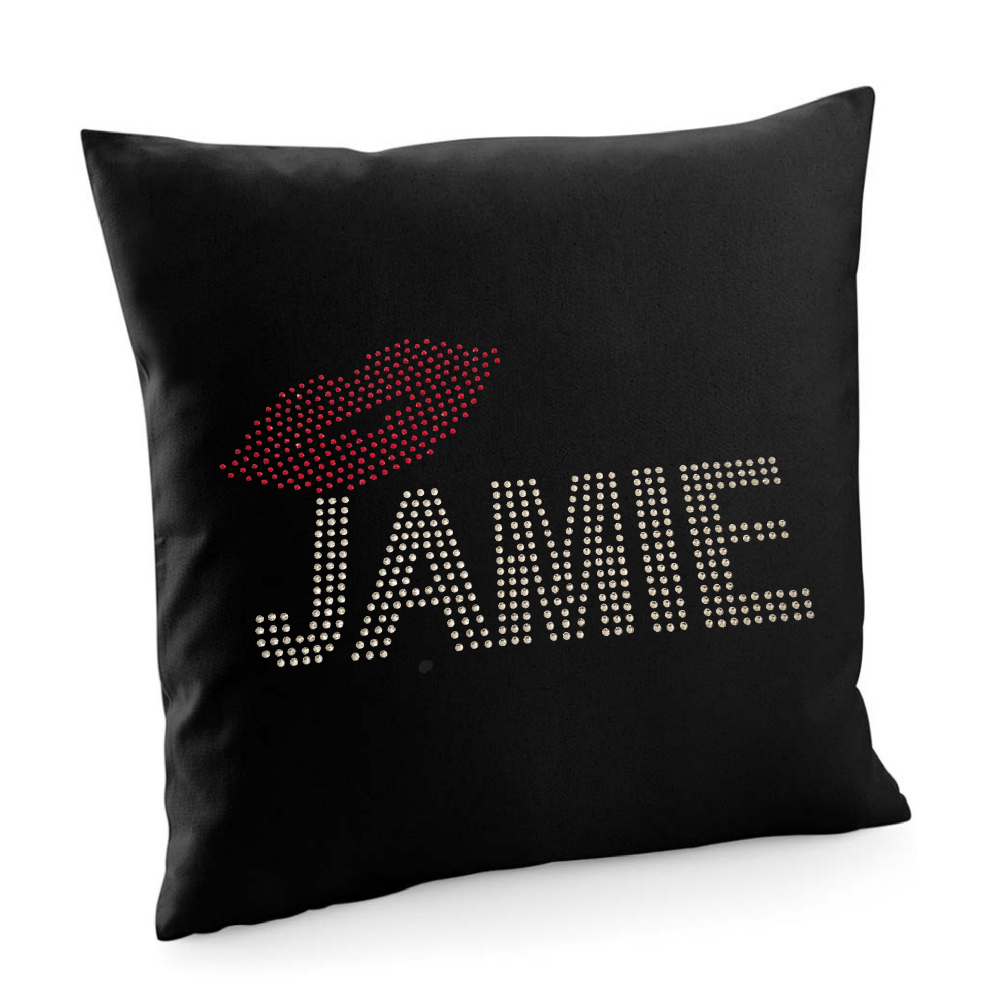 EVERYBODY'S TALKING ABOUT JAMIE, BLACK COTTON CUSHION COVER WITH SILVER JAMIE LETTERING, WITH RED LIPS SET ABOVE THE J.
THE DESIGN IS MADE UP OF HOT FIX RHINESTONES THAT ARE HEAT PRESSED AND CATCH THE LIGHT BEAUTIFULLY