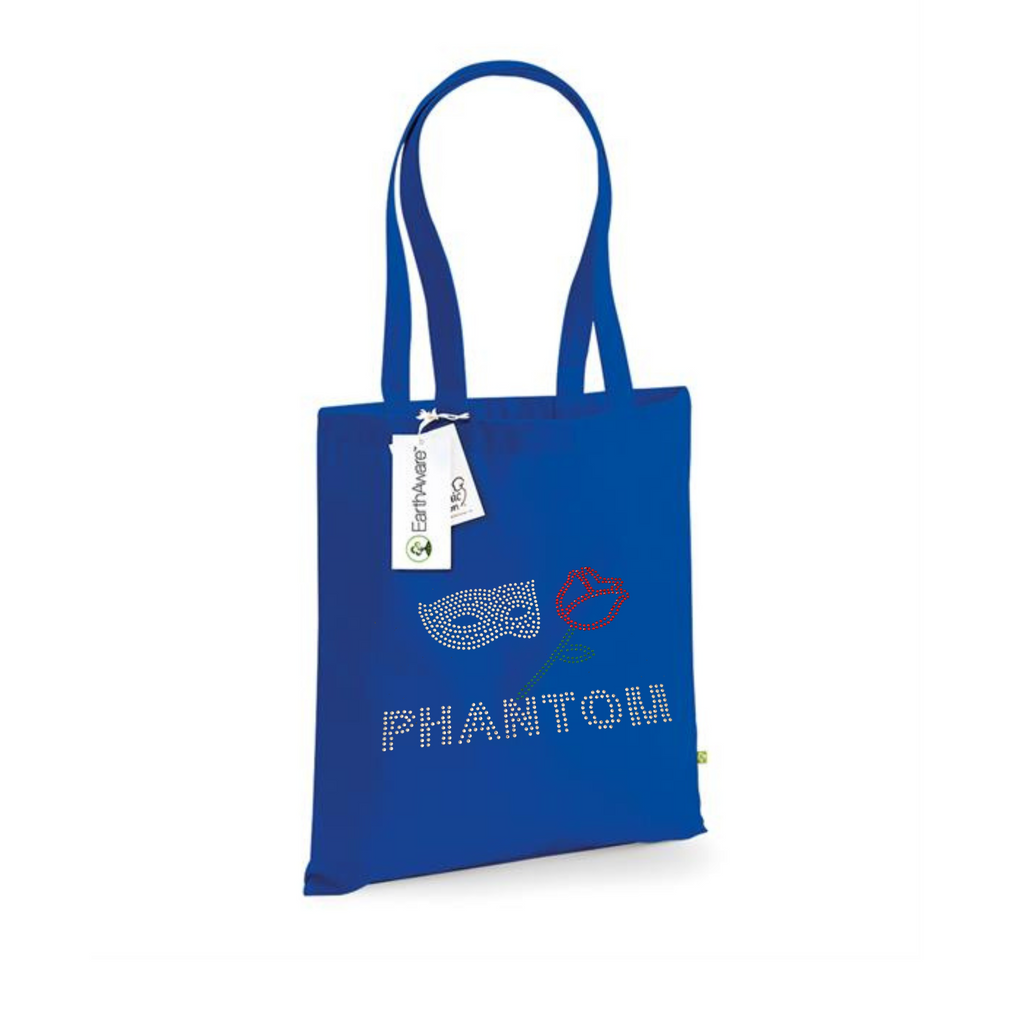 ROYAL BLUE  COTTON TOTE BAG WITH LONG HANDLES WITH PHANTOM LETTERING, ABOVE THIS A SILVER MASK AND RED ROSE WITH GREEN STEM AND LEAF.
THE DESIGN IS MADE UP OF HOT FIX RHINESTONES THAT HEAT PRESSED AND CATCH THE LIGHT BEAUTIFULLY
