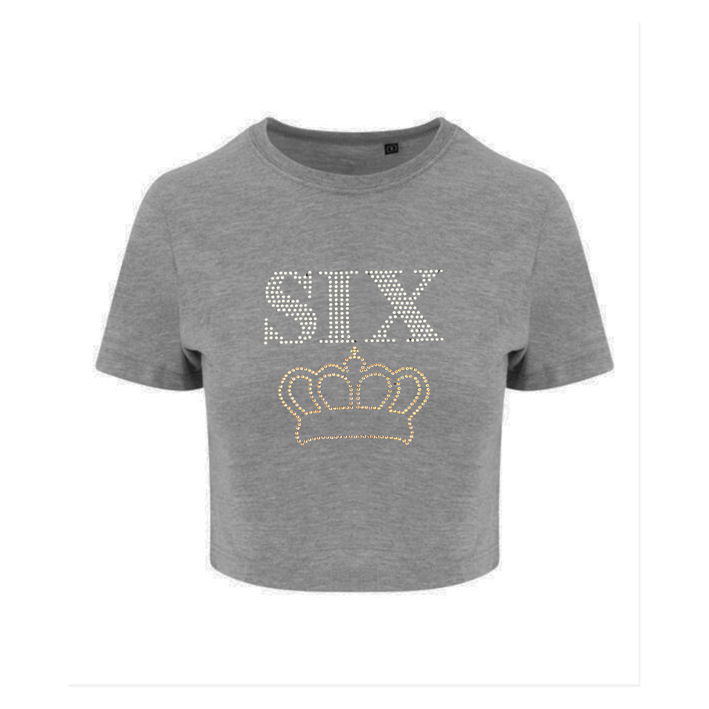 BLACK CROP T SHIRT WITH GOLD CROWN ON THE FRONT, JUST ABOVE THE CROWN IS SILVER SIX LETTERING.
GREY SHORT SLEEVE T SHIRT, ON THE FRONT IS GOLD SIX LETTERING ABOVE   THE DESIGN IS MADE UP OF HOT FIX RHINESTONES THAT HEAT PRESSED AND CATCH THE LIGHT BEAUTIFULLY