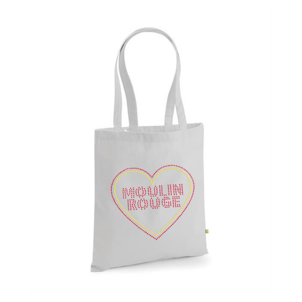 Light grey heavy cotton tote bag, with a moulin rouge inspired design on the front. The design is made up of Moulin Rouge lettering in red sparkling stones, there is also a red and gold heart around the writing, the design is made up of hot fix rhinestones that are heat pressed